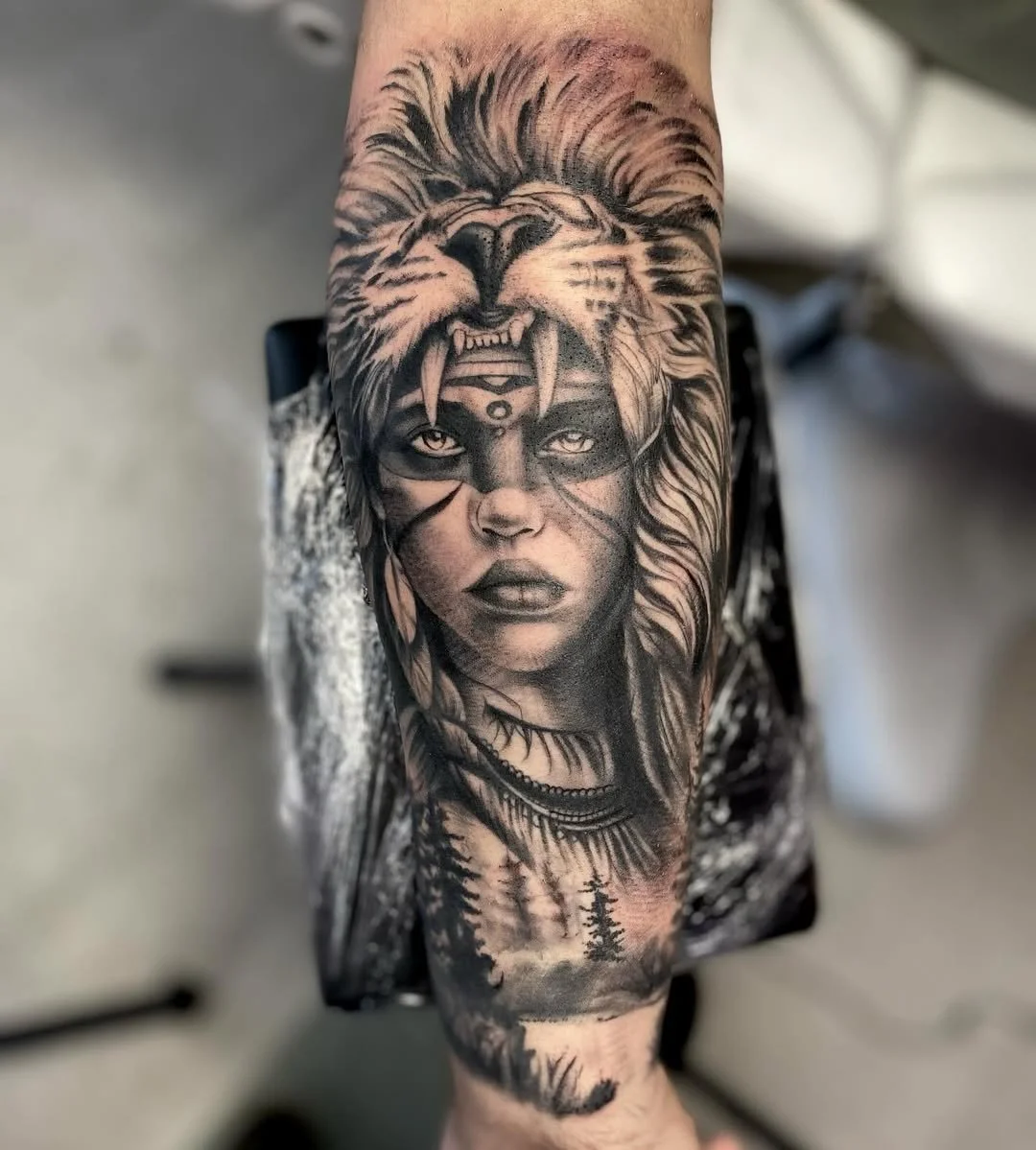 Black and grey portrait tattoo of a Native American woman by Kylie Lesko